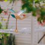 Hanging bird pinewood mobile toy in natural and pastel tones by Eguchi